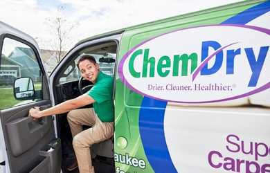 commercial carpet cleaning tech leaves vehicle
