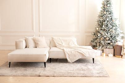 clean area rug in modern living room decorated for holidays