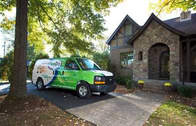 Chem-Dry carpet cleaning service van in front of home