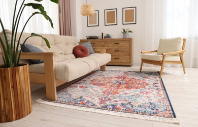 oriental rug on floor with couch and chair